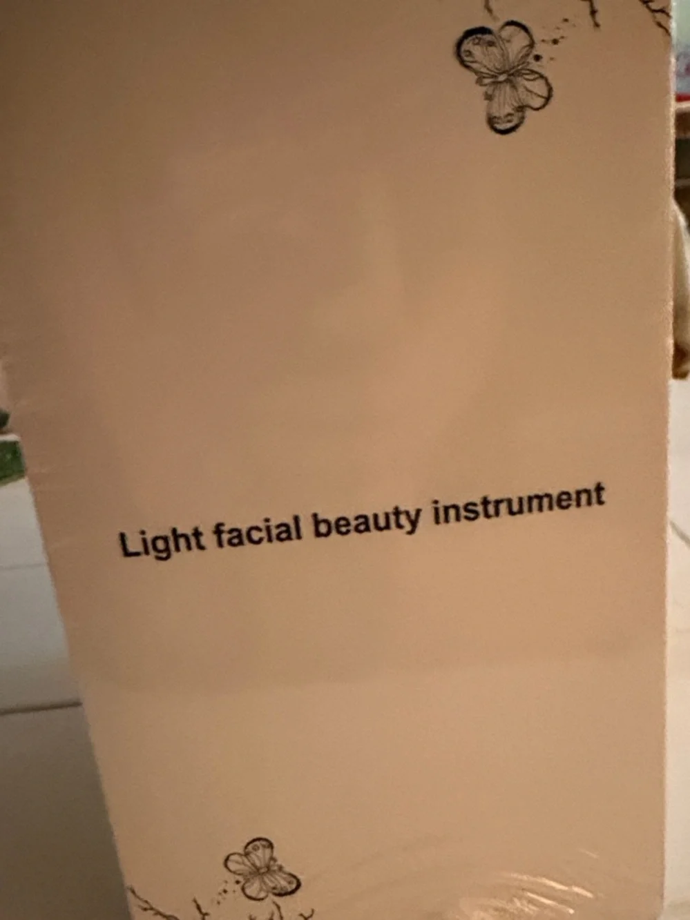 Light Facial Beauty Instrument - Cream/Peach Packaging